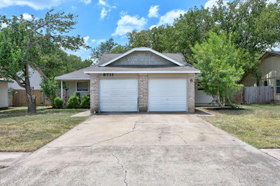 8711 Pineridge Dr — photo 2